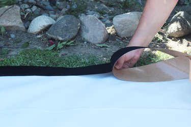 Placing the felt on the edge of the screen.