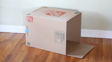 Top and side flaps cut off of box