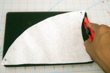 Materials you'll need to cut a foam shark fin from a paper template