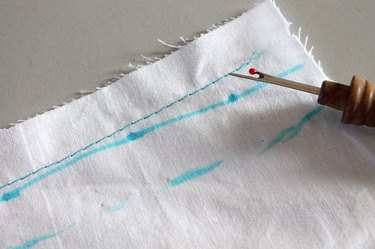 Take out adjusted seams with a seam ripper.
