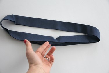 press waistband in half