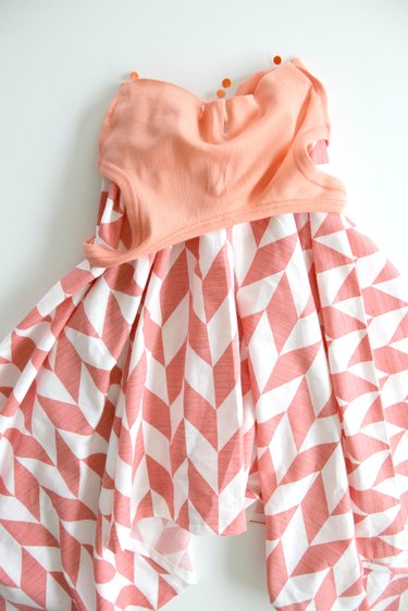Pin the skirt and tank top right sides together and sew