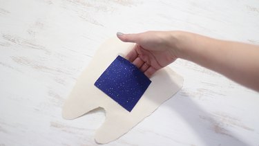 Money pouch glued to back piece