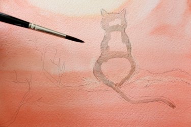 Paint outline of cat with light black.