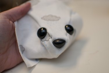 Add the eyes to the face.