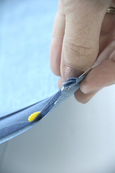 Sew bias tape to remote caddy edges