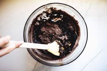 Use a rubber spatula to fold the dry ingredients into the batter until smooth.