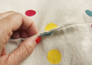 Pinch the folds together
