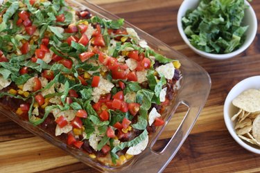 Taco Casserole with extra lettuce and tortilla chips