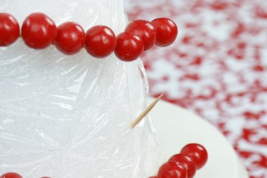 Insert toothpick at an upward angle.