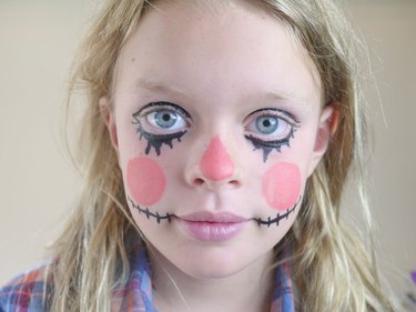 Long eyelashes and stitch marks added.
