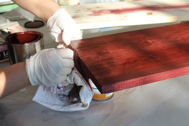 Staining the wood.