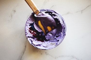 Add in a few drops of dye at a time. It doesn't take much for the color to deepen!