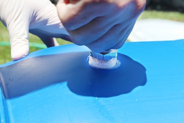 attaching a pipe to the overflow hole