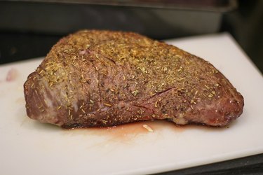 Tri-tip resting on a cutting board