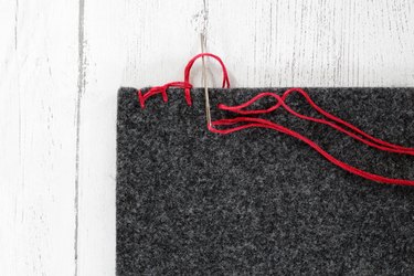 push needle through loop