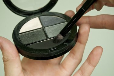 Apply black eye shadow