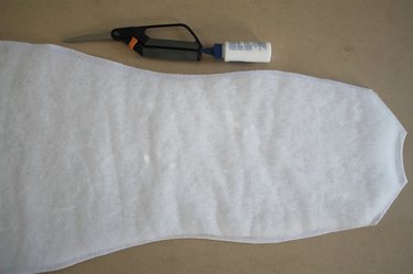 Place the batting, glue side down, onto the white felt front piece.