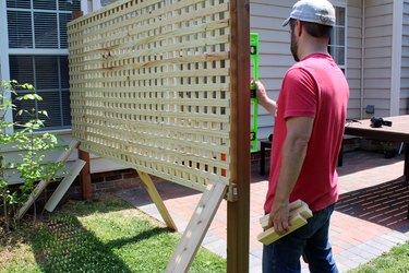 use scrap wood to prop up screen
