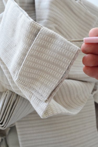 Rip out the seams on the tabs.