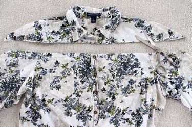cut new neckline across the shirt