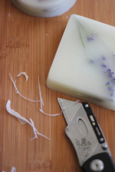 Gently remove excess wax from the sides of the sachets if required.