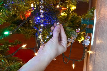 Secure the end of the sting of beads