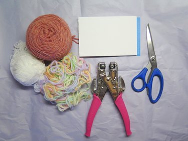 Materials you need to make a pompom bookmark