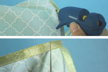 Glue ribbon around the top and bottom embroidery hoops.