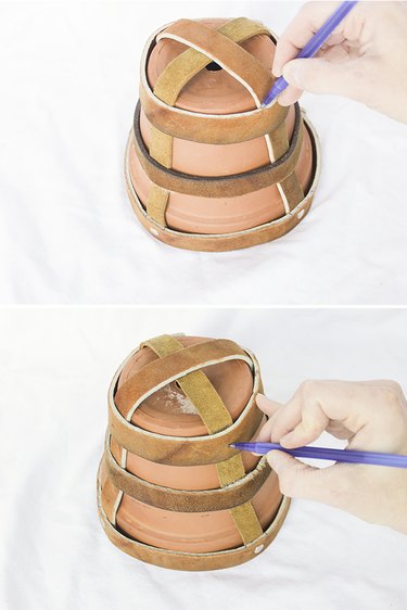 Marking leather support straps.