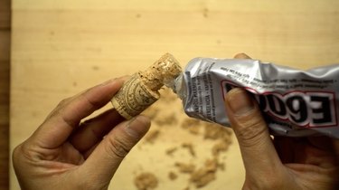 Preparing cork for DIY glass beaded garden sparkler.