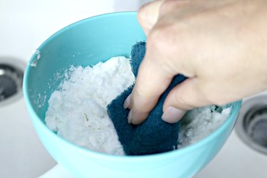 Bowl of homemade cleaner for white sinks