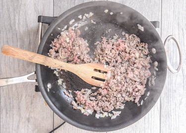 Browning beef in a pan for Cheeseburger Dip