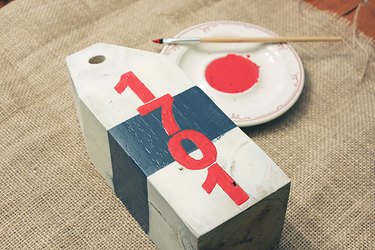 Paint the numbers with a small paintbrush