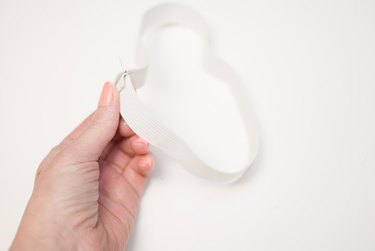 Sew the elastic into a loop.