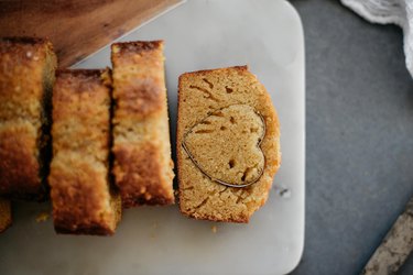 Use a cookie cutter to stamp out hearts out of the cake.