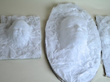 Ghosts on top of the boards showing the trimmed cheesecloth.