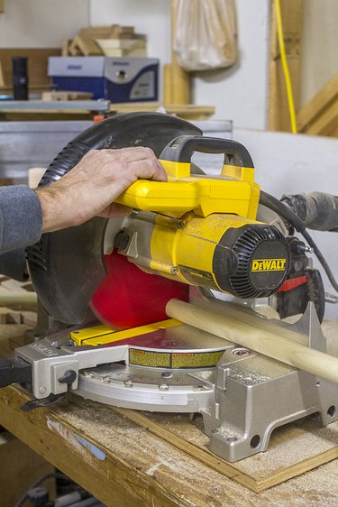 Cut the wooden dowels at the pre-marked lines.