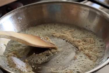 Whole-wheat flour cooking in butter.