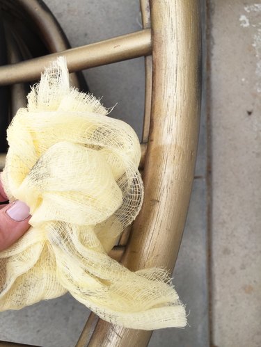 Wipe down the chair with a tack cloth.