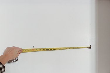 Distance between screws on bookcase.