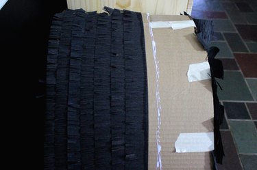 adding fringe to piñata