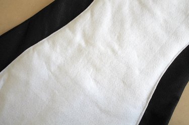 Topstitch the white felt front to the black felt front.