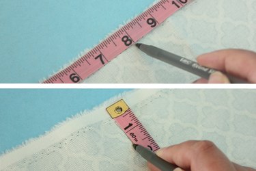 Mark the measurements on the fabric.