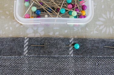 Pin the hem in place.