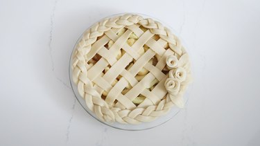 Pie decorated with lattice, braids, and roses