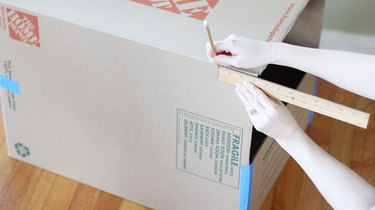 Marking 3 inches on side of box