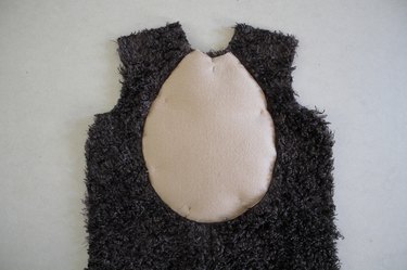 Topstitch the stomach patch onto the front of the bear.