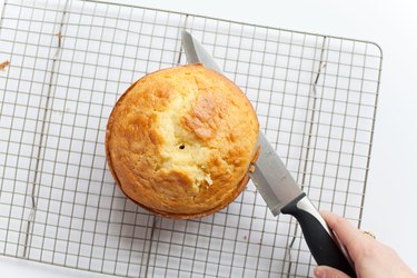 Cutting the top layer off the cake
