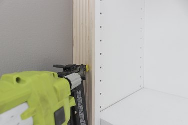 Attaching casing against wall